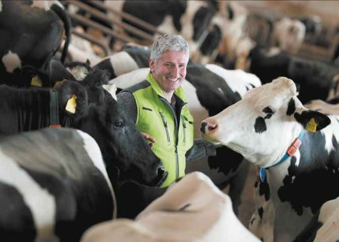 Farmer with cows